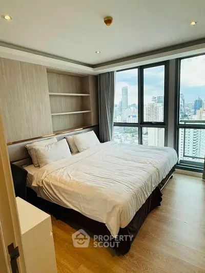 Luxurious bedroom with stunning city view and modern decor