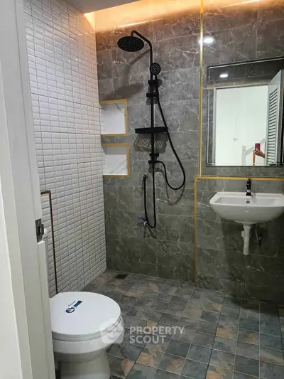 Modern bathroom with sleek shower and stylish tile design