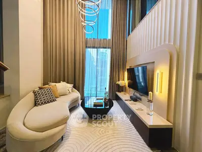 Luxurious modern living room with high ceilings and elegant decor