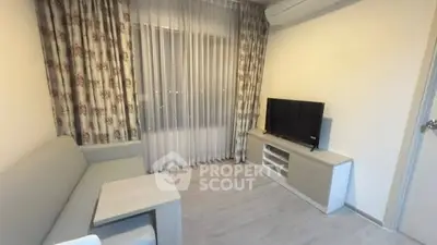 Cozy living room with modern decor and natural light