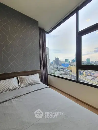 Modern bedroom with panoramic city view and stylish decor