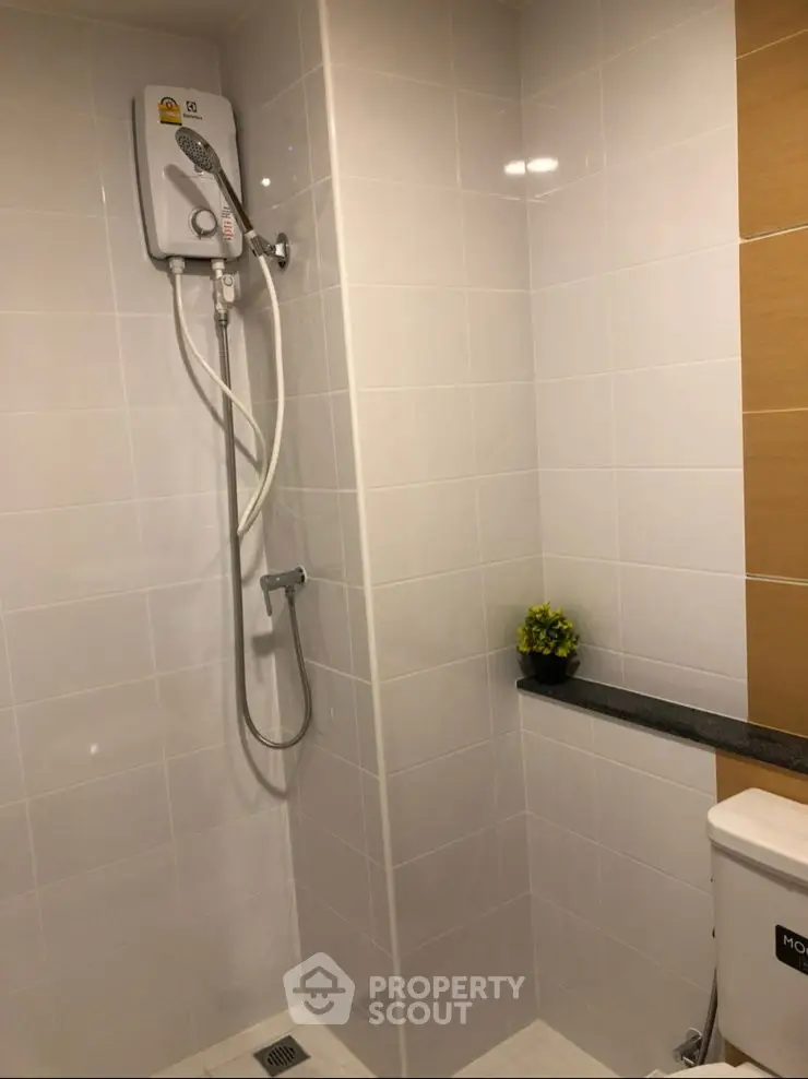 Modern bathroom with sleek shower and stylish tile design