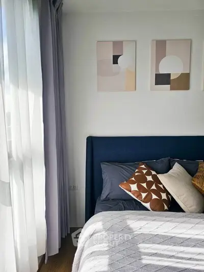 Cozy bedroom with modern decor and natural light