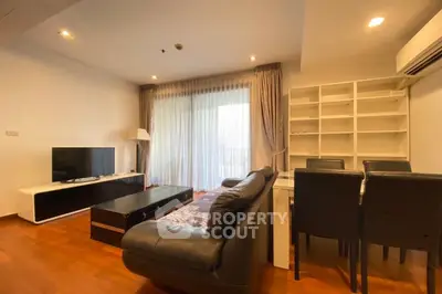 Spacious living room with modern furniture and natural light