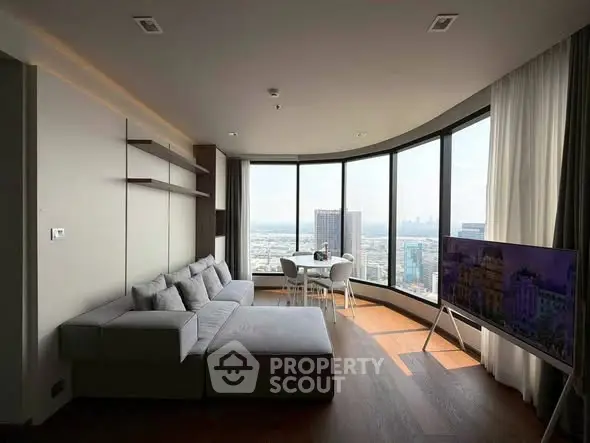 Luxurious living room with panoramic city view and modern furnishings