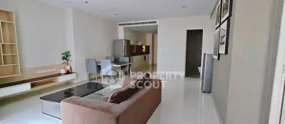 Spacious modern living room with open kitchen and elegant decor