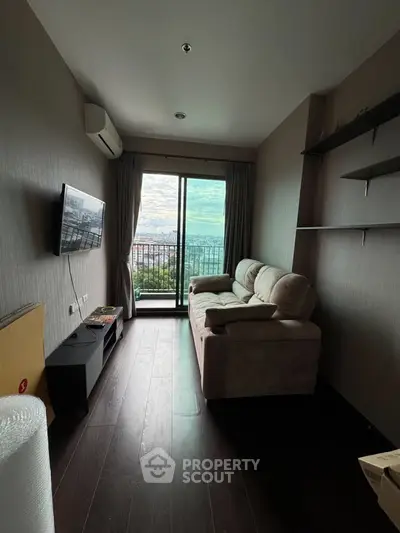 Cozy living room with balcony view in modern apartment