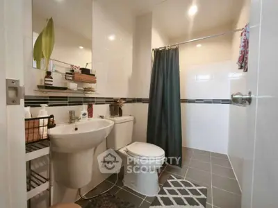 Modern bathroom with sleek fixtures and stylish tile design
