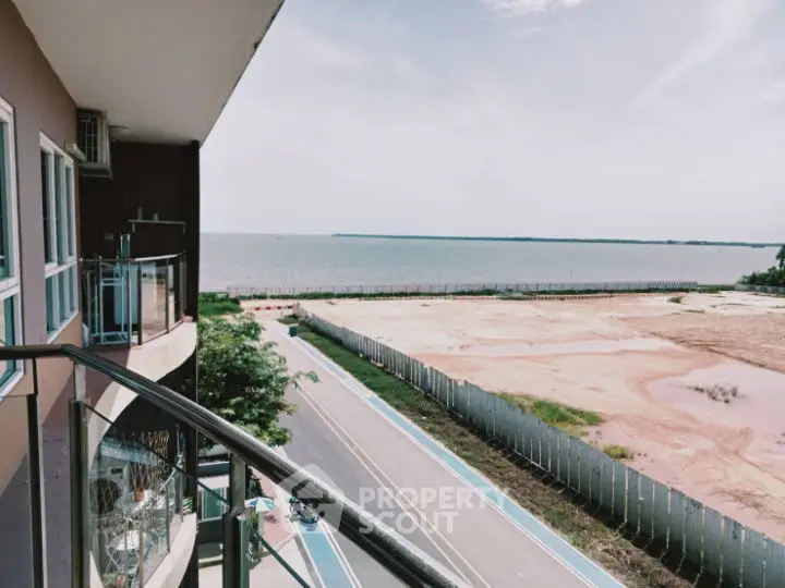 Stunning ocean view from a modern balcony, perfect for relaxation and enjoying the serene surroundings.