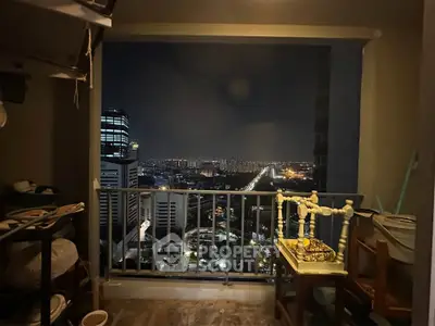 Stunning night cityscape view from a high-rise balcony, perfect for urban living enthusiasts.