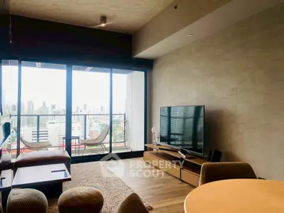 Modern living room with city view and stylish furniture in high-rise apartment