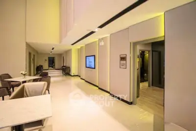 Luxurious modern building lobby with elegant seating and ambient lighting