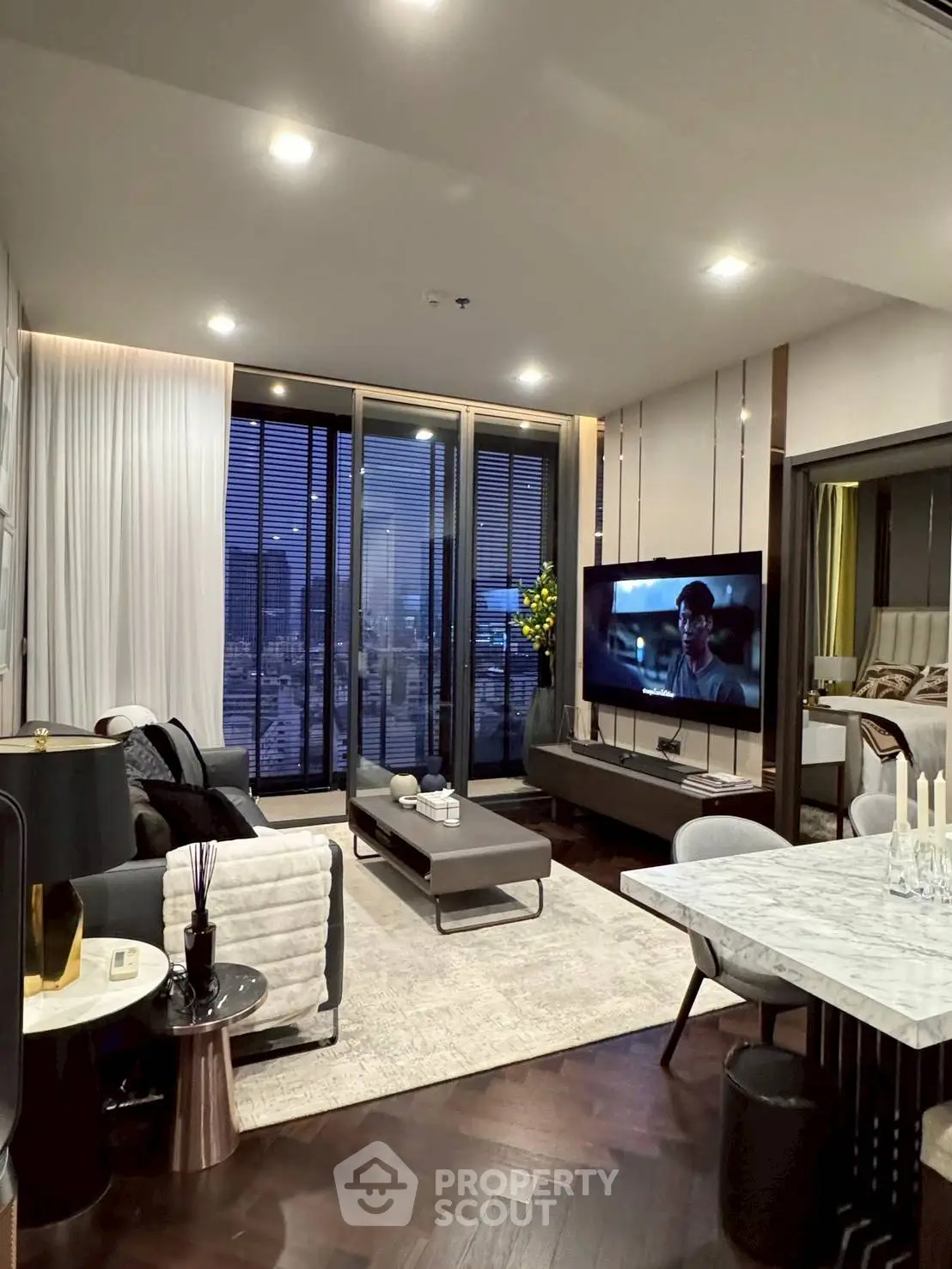 Luxurious modern living room with city view and elegant decor