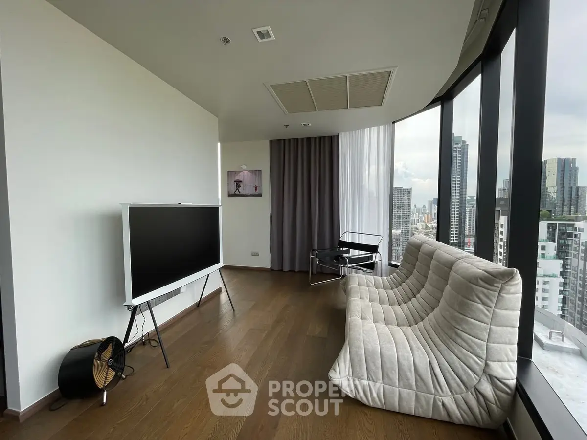 Modern living room with panoramic city view and stylish furniture