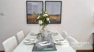 Elegant dining room with modern decor and stylish table setting