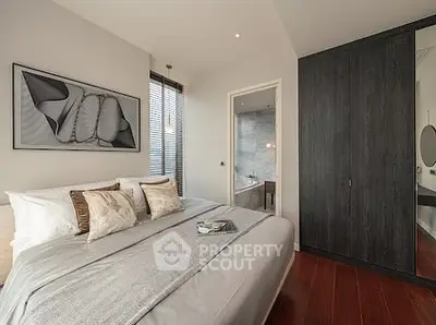 Luxurious bedroom with ensuite bathroom and modern decor