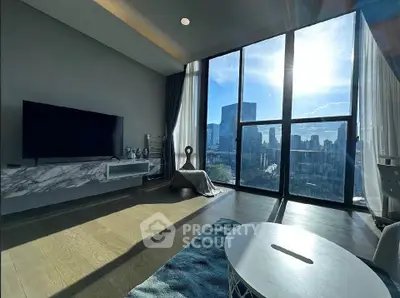 Luxurious living room with floor-to-ceiling windows offering stunning city views and modern decor.