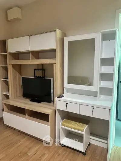 Modern living room with stylish wooden TV unit and elegant vanity desk