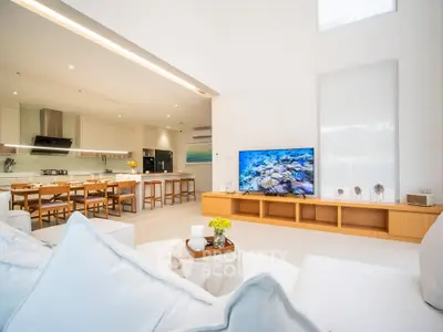 Spacious modern living room with open kitchen and stylish decor