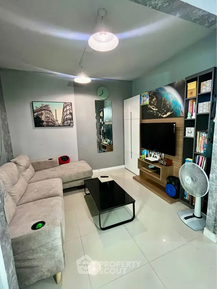 Cozy living room with modern decor and entertainment center