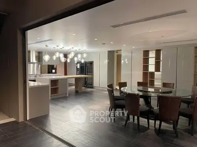 Luxurious modern kitchen with open layout and elegant dining area