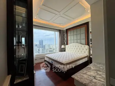 Luxurious bedroom with city view and elegant decor