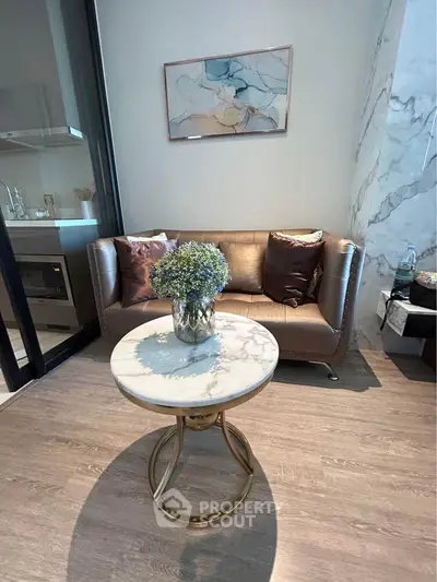 Modern living room with elegant sofa and marble coffee table