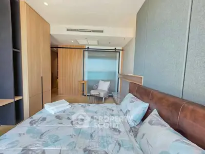 Modern bedroom with stylish decor and natural light