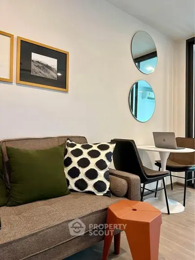 Modern living room with stylish decor and cozy seating area