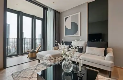 Modern living room with elegant decor and city view balcony
