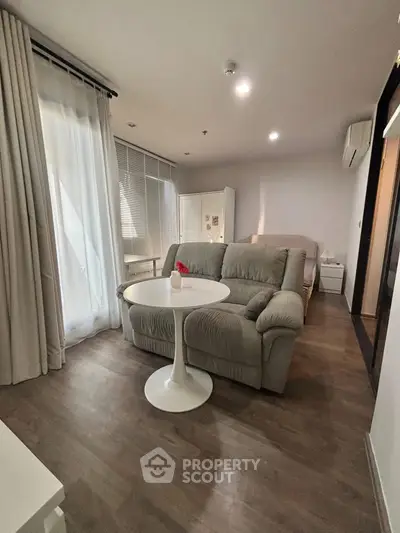 Cozy living room with plush sofa and modern decor