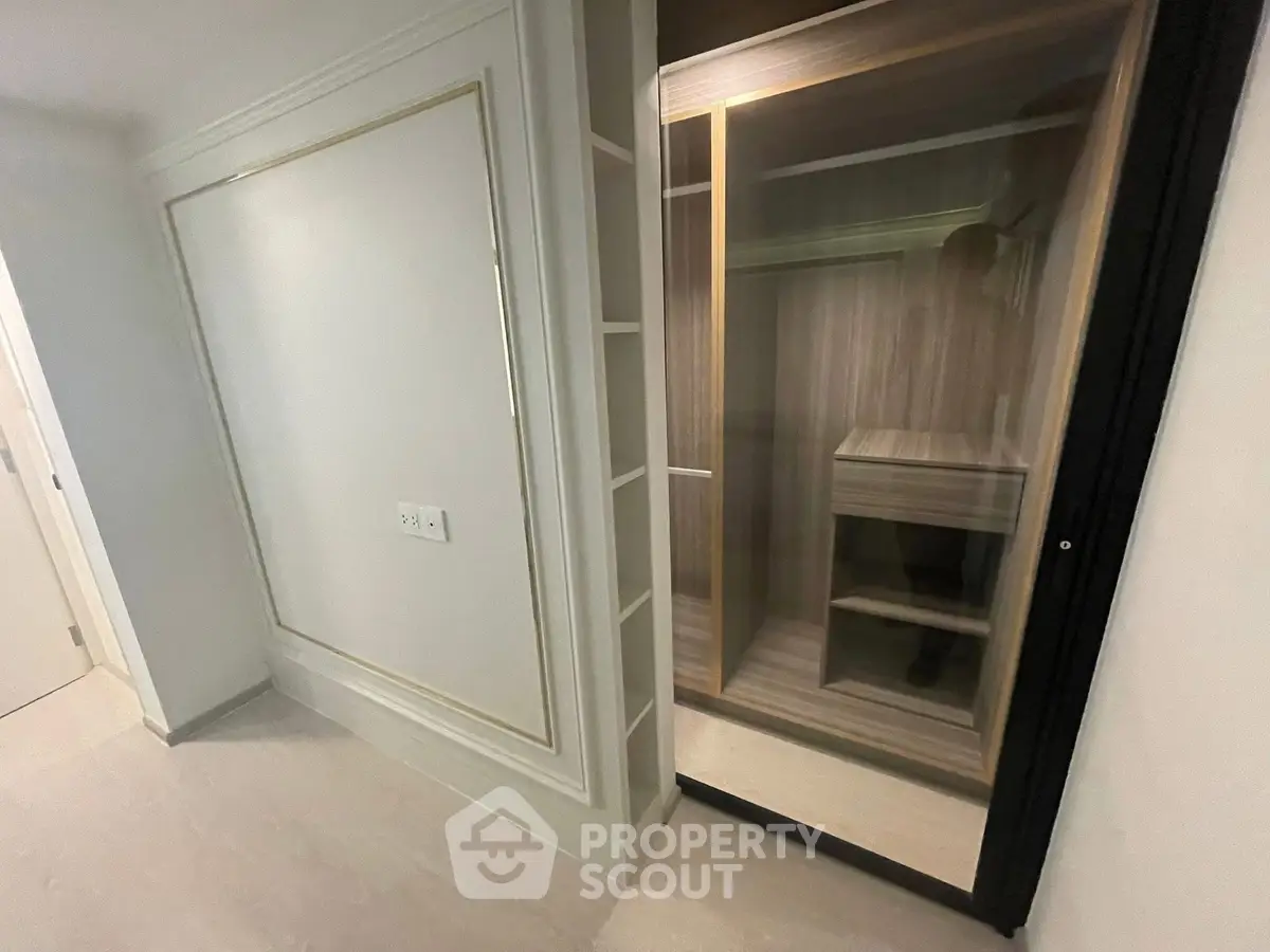 Modern walk-in closet with sleek design and ample storage space