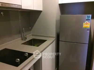 Modern kitchen with sleek appliances and minimalist design