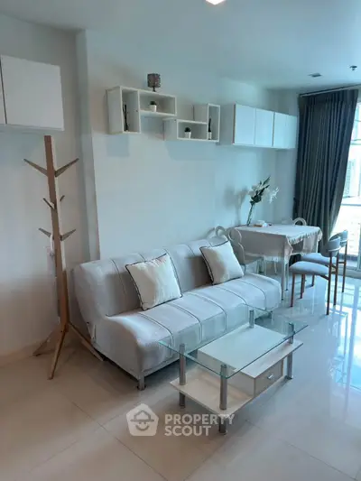 Modern living room with stylish furniture and natural light