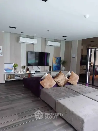 Spacious modern living room with stylish decor and large sectional sofa