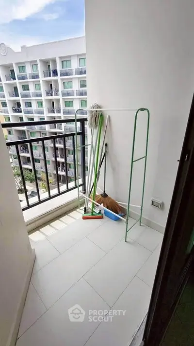 Charming balcony with city view, perfect for relaxation and enjoying the outdoors.