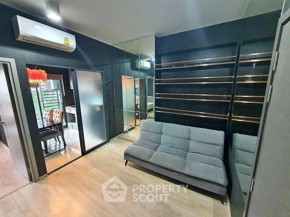 Modern living room with sleek design and stylish furniture in a contemporary apartment.