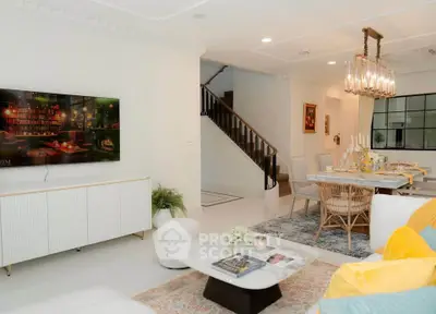 Spacious living room with elegant dining area and modern decor