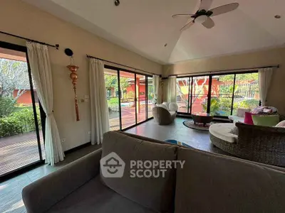 Spacious living room with garden view and modern decor