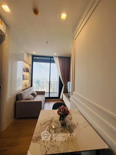 Modern living room with balcony view and elegant decor