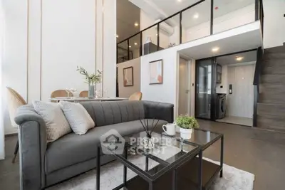 Modern loft-style living room with elegant decor and open layout