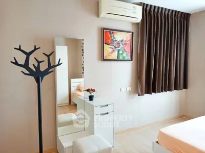 Modern bedroom with stylish decor and air conditioning unit