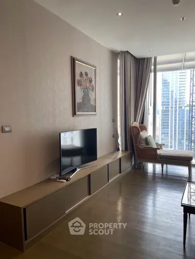 Spacious modern living room with city view, elegant decor, and natural light.