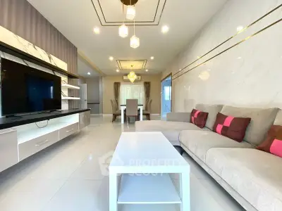 Spacious modern living room with elegant decor and open layout, perfect for entertaining.