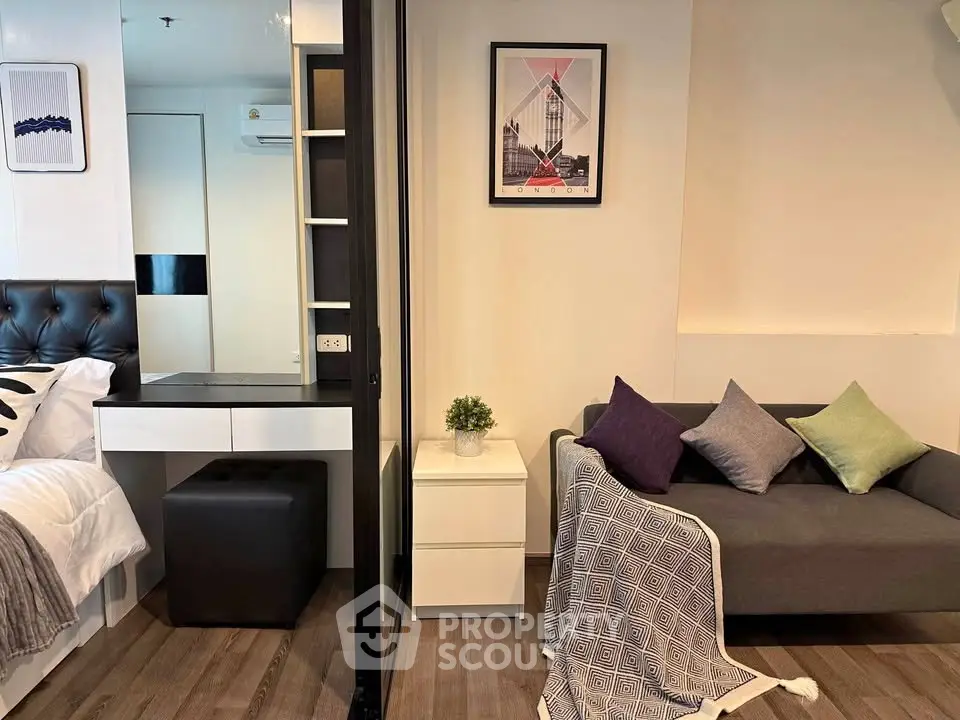 Modern studio apartment with stylish decor and cozy living area