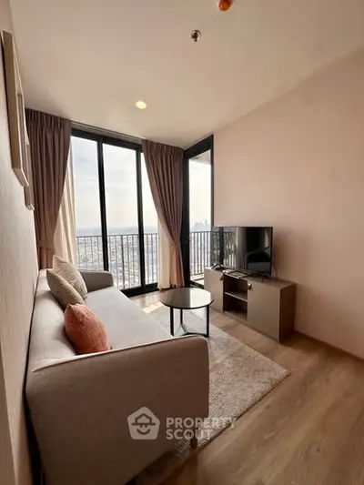 Modern living room with panoramic city view, cozy sofa, and sleek TV setup.