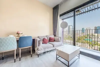 Modern living room with balcony view in urban apartment