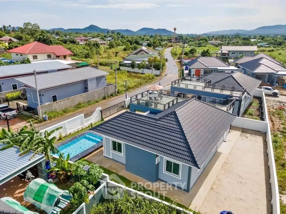 Charming suburban home with pool and scenic mountain views, perfect for family living.