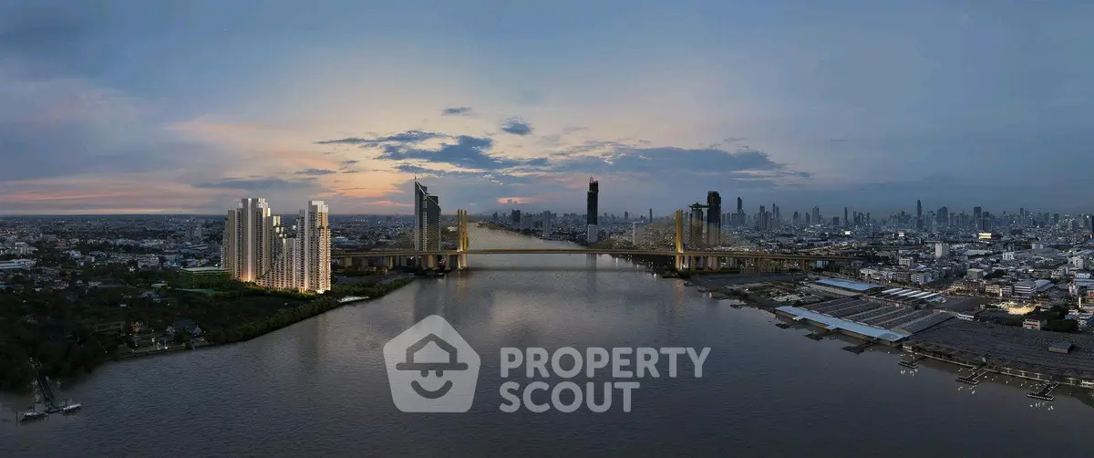 Stunning cityscape view with river and illuminated bridge at dusk, highlighting modern high-rise buildings.