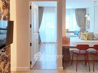 Charming open-plan living space with stylish decor and natural light